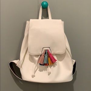 White leather backpack with multi-color tassel